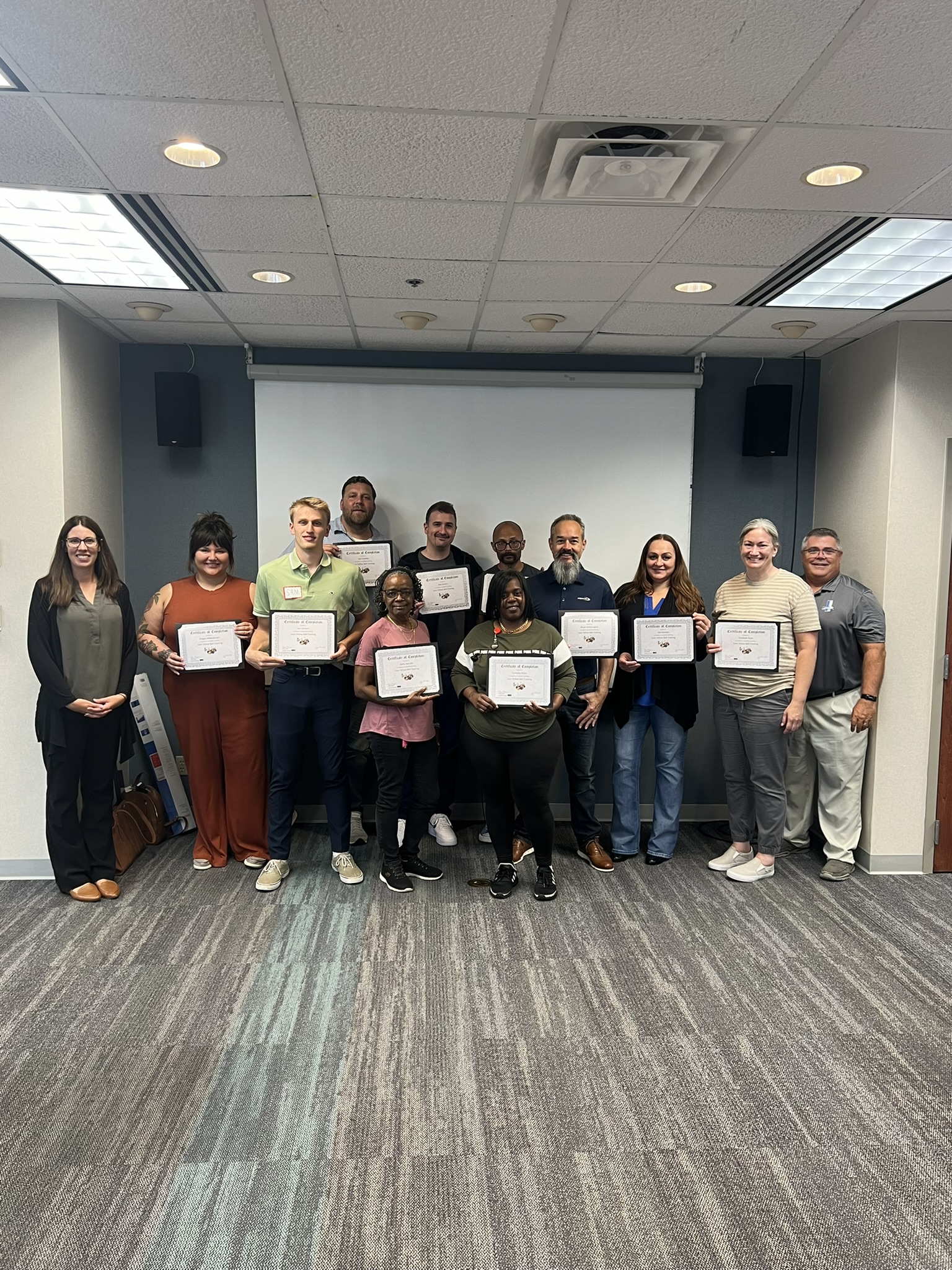 Team members receiving lean certifications